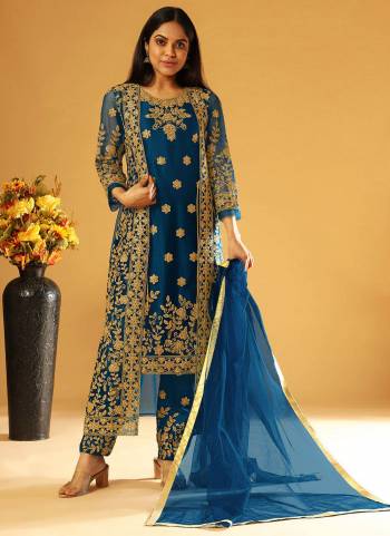 Get Ready For The Upcoming Festive And Wedding Season With This Designer Suit In Beautiful Color. This Suit And koti  Is Butterfly Net Based Fabric And Pair With Japan Satin Bottom And Dupatta. Beautified With Heavy Cording,Embroidery,Diamond Work