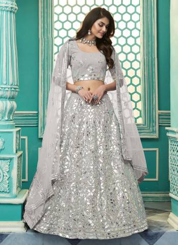 For A Designer Look , Grab These Lehenga in All Over Pretty Colored.These lehenga And Blouse Are Fabricated On Georgette Based Pair With Net Dupatta.Beautified With Heavy Work.