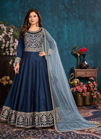 Simple And Elegant Looking Suit Is Here In Fine Colored.its Top is Fabricated On Art Silk Pair With Santoon Bottom And Net Dupatta.Beautified With Designer Heavy Embroidery Work