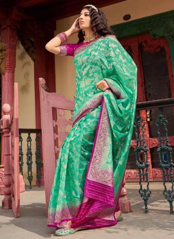 For A Proper Look,Grab These Lovely Colored Saree Pair With Pretty Blouse.its Saree And Blouse Are Fabricated On Silk Organza With Heavy Wevon Designer