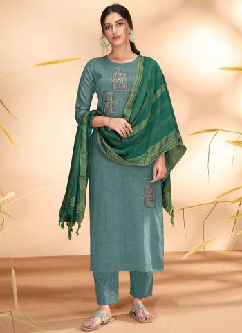 Here Is An Attractive Looking Readymade Suit In Pretty Colored.Its Top And Bottom Are Fabricated On Cotton Based Pair WIth Banarasi Viscose Dupatta.Beautified Wth Designer Work.its Available in All Regular Size