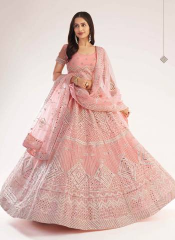 For A Designer Look , Grab These Heavy Designer Lehenga in Beautiful Colored.its Lehenga And Blouse Are Fabricated On Net Based Pair WIth Net Dupatta Beautified With Heavy Designer Work