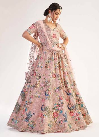 For A Designer Look , Grab These Heavy Designer Lehenga in Beautiful Colored.its Lehenga And Blouse Are Fabricated On Net Based Pair WIth Net Dupatta Beautified With Heavy Designer Work