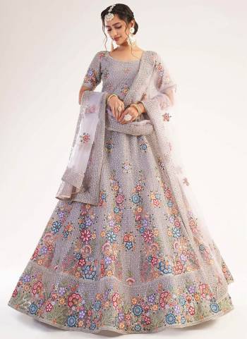 For A Designer Look , Grab These Heavy Designer Lehenga in Beautiful Colored.its Lehenga And Blouse Are Fabricated On Net Based Pair WIth Net Dupatta Beautified With Heavy Designer Work