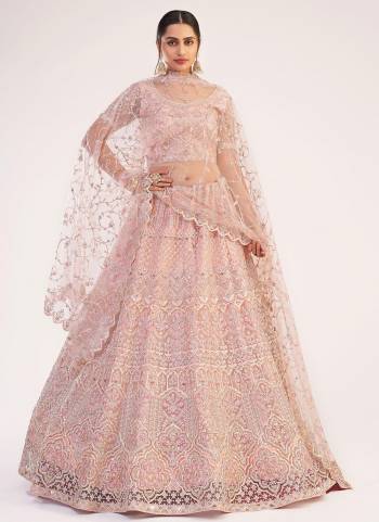 For A Designer Look , Grab These Heavy Designer Lehenga in Beautiful Colored.its Lehenga And Blouse Are Fabricated On Net Based Pair WIth Net Dupatta Beautified With Heavy Designer Work