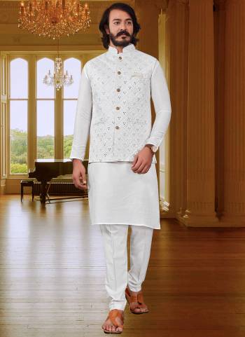 Take your ethnic style quotient to the next level by wearing this fashionable kurta set. which has been designed keeping the latest trends in mind. This set is a Art Silk Base Fabricated With Designer  Mirror Embroidery Work.It will augment your look and make you the centre of attraction at any occasion