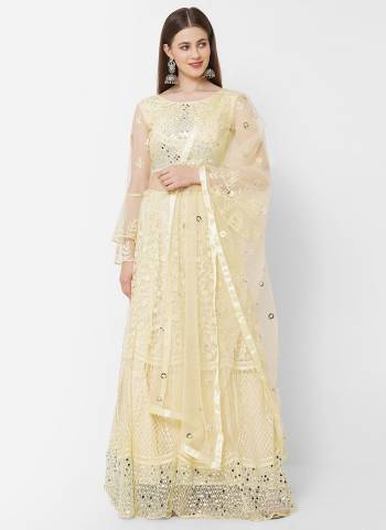 For A Pretty Look , Grab These Designer Lehenga Choli In Lovely Colored. Its Lehenga Is Fabricated On Net Based.Beautified With Designer Mirror Work.Buy Now.