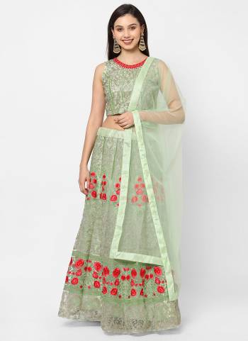 For A Pretty Look , Grab These Designer Lehenga Choli In Lovely Colored. Its Lehenga Is Fabricated On Net Based.Beautified With Designer Mirror Work.Buy Now.