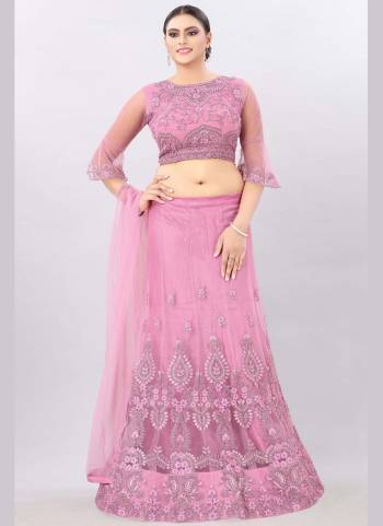 Grab These Lehenga Choli in All Over Pretty Colored.Its Lehenga is Fabricated On Net Based.Beautified With Designer Embroidery Work