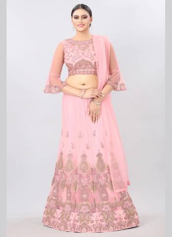 Grab These Lehenga Choli in All Over Pretty Colored.Its Lehenga is Fabricated On Net Based.Beautified With Designer Embroidery Work