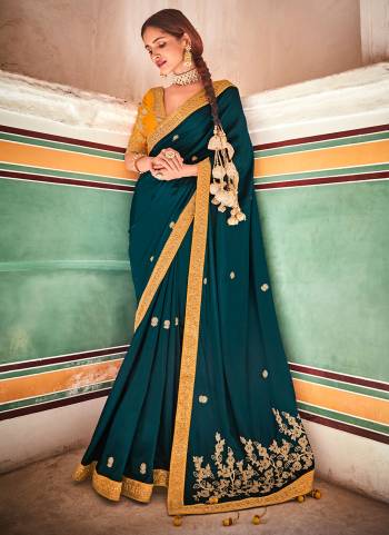 Grab These Beautiful Saree In Pretty Colored Pair With Matching Blouse.Its Saree is Fabricated On Crepe Silk Pair With Art Silk Blouse.Beautified With Heavy Work.