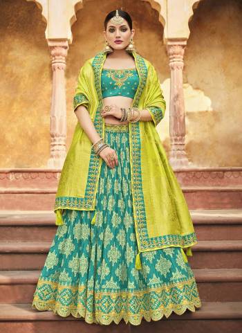 Choose A New Trend For The Pretty Look With This Heavy Designer Lehenga Choli In All Over Lovely Color. This Lehenga Choli Is Fabricated On Silk Paired With Silk Fabricated Dupatta. It IS Beautified With Wevon Designer,Jari,Cord,Sequance Embroidery,Khatli Hand Work Which Gives A Unique Look To It. Grab This Pretty Collection  And Begin A New And Amazing Trend.