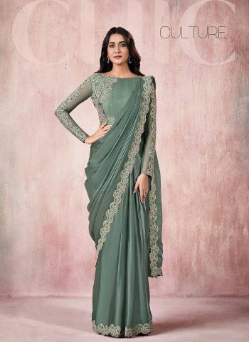 Adorn The Angelic Look Wearing This Readymade Saree In Lovely Color Paired With Designer?Blouse. This Saree Is Fabricated OnSatin Silk Based.Come With Heavy Work. Buy This Saree Now