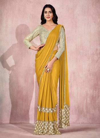 Adorn The Angelic Look Wearing This Readymade Saree In Lovely Color Paired With Designer?Blouse. This Saree Is Fabricated On Lycra Based.Come With Heavy Work. Buy This Saree Now