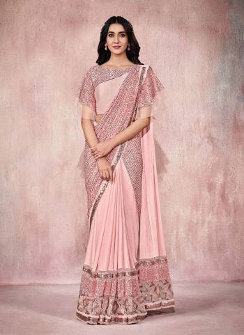 Adorn The Angelic Look Wearing This Readymade Saree In Lovely Color Paired With Designer?Blouse. This Saree Is Fabricated On Lycra Based.Come With Heavy Work. Buy This Saree Now