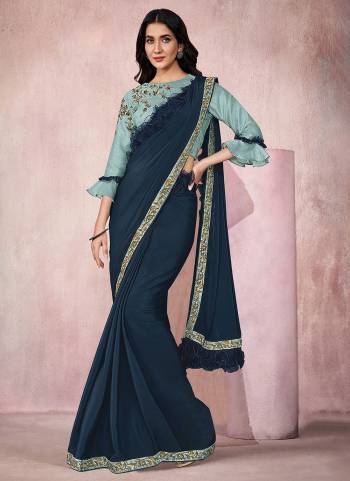 Adorn The Angelic Look Wearing This Readymade Saree In Lovely Color Paired With Designer?Blouse. This Saree Is Fabricated On Lycra Based.Come With Heavy Work. Buy This Saree Now