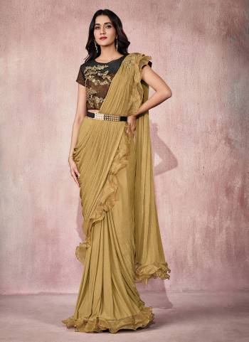 Adorn The Angelic Look Wearing This Readymade Saree In Lovely Color Paired With Designer?Blouse. This Saree Is Fabricated On Lycra Based.Come With Heavy Work. Buy This Saree Now