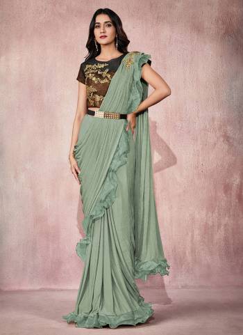 Adorn The Angelic Look Wearing This Readymade Saree In Lovely Color Paired With Designer?Blouse. This Saree Is Fabricated On Lycra Based.Come With Heavy Work. Buy This Saree Now