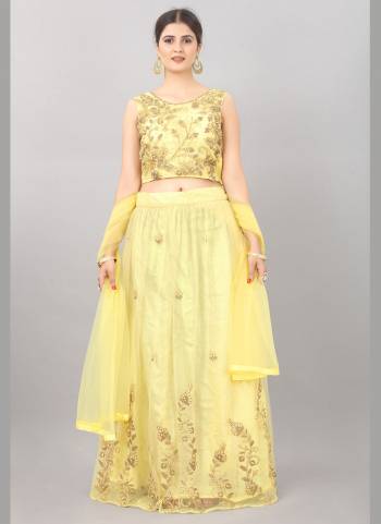 For A Fair Beauty, Grab This Lovely Designer Lehenga In All Over Pretty Colored.This Lehenga Is Fabricated On Net Based Beautified With Designer Work.