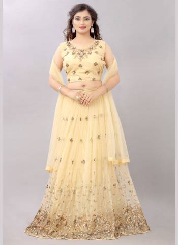 For A Fair Beauty, Grab This Lovely Designer Lehenga In All Over Pretty Colored.This Lehenga Is Fabricated On Net Based Beautified With Designer Work.