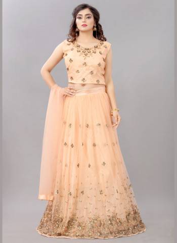 For A Fair Beauty, Grab This Lovely Designer Lehenga In All Over Pretty Colored.This Lehenga Is Fabricated On Net Based Beautified With Designer Work.