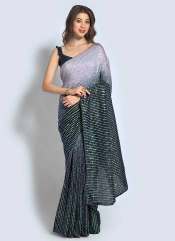 Rich And Elegant Looking Saree Is Here WIth Pretty Colored Paired With Blouse.?This Saree Is Fabricated On Georgette And Blouse Are Fabricated On Banglori Silk Beautified With Designer Sequance Embroidery Work.