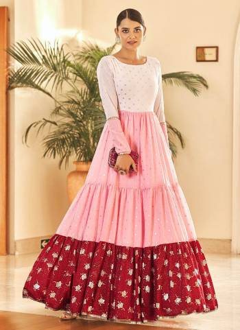 Celebrate This Festive Season With Beauty And Comfort With This Gown In Pretty Colored.This Gown Is Fabricated On Georgette Based With Metalic Foil Printed. It Will Definitely Earn You Lots Of Compliments From Onlookers