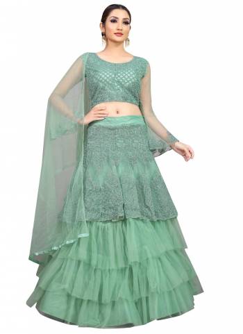 Subtle Shades Gives You Comfort And Keep You Cool. Add This Pretty Colored Lehenga To Your Wardrobe Paired With Choli And Dupatta.This Lehengal Is Fabricated On Nylon Net Pair With Blouse And Dupatta.