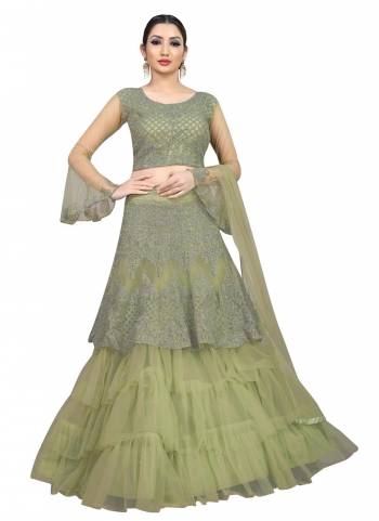 Subtle Shades Gives You Comfort And Keep You Cool. Add This Pretty Colored Lehenga To Your Wardrobe Paired With Choli And Dupatta.This Lehengal Is Fabricated On Nylon Net Pair With Blouse And Dupatta.