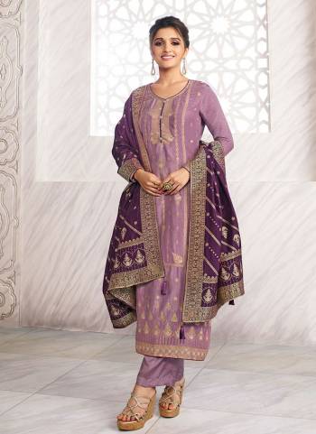 Flaunt Your Rich And Elegant Taste Wearing This Suit In Lovely Color Paired With Same Colored Bottom And Dupatta. This Suit Is Fabricated On Dola Jacquard Pair With Santoon Bottom And Dola Jacquard Dupatta. Beautified with Woven Designer. It Is Gives Your Personality A Very Sophisticated Look