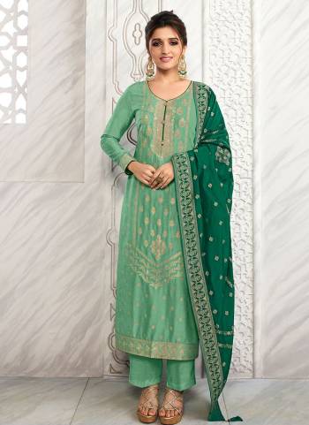 Flaunt Your Rich And Elegant Taste Wearing This Suit In Lovely Color Paired With Same Colored Bottom And Dupatta. This Suit Is Fabricated On Dola Jacquard Pair With Santoon Bottom And Dola Jacquard Dupatta. Beautified with Woven Designer. It Is Gives Your Personality A Very Sophisticated Look