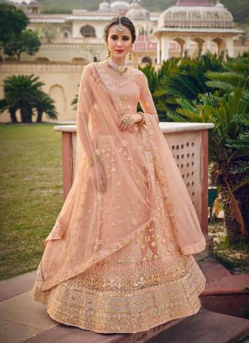 Add This Very Pretty Colored  To Your Wardrobe With This Designer?Lehenga.These Lehenga And Blouse Are Fabricated On Net Based Pair With Net Dupatta Come With Heavy Designer Work.