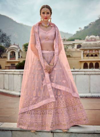 Add This Very Pretty Colored  To Your Wardrobe With This Designer?Lehenga.These Lehenga And Blouse Are Fabricated On Net Based Pair With Net Dupatta Come With Heavy Designer Work.