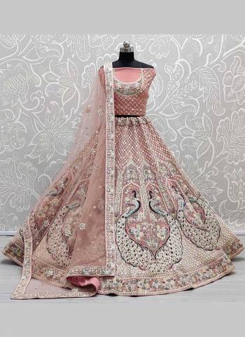 You Will Definitely Earn Lots Of Compliments Wearing This Designer Lehenga Come With Net Based Fabric Pair With Net Blouse And Dupatta.Its Beautified With Heavy Designer Work.