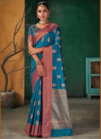 Most Demanding Color Of The Season Is Here With This Beautiful Saree.These Saree And Blouse Are Fabricated On Silk Based.Its Beautified With Heavy Wevon Designer