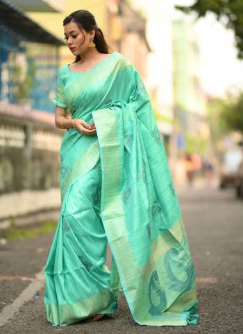 Most Demanding Color Of The Season Is Here With This Beautiful Saree.These Saree And Blouse Are Fabricated On Silk Based.Its Beautified With Heavy Wevon Designer