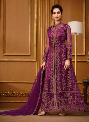 Rich And Elegant Looking Designer Suit Is Here In Pretty Colored Top Paired With Matching Colored Bottom And Dupatta. Its Top Is Fabricated On Soft Net Pair With Japan Crepe Bottom And Soft Net Dupatta.Beautified With  Designer Embroidery Work.