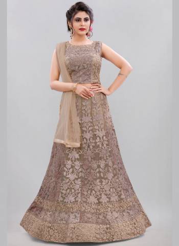 For A Different Look , Grab These Beautiful Lehenga in Lovely Colored Pair With Blouse And Dupatta.These Lehnega is Fabricated On Net Based Pair With Net Blouse And Net Dupatta.Its Beautified With Designer Embroidery Work