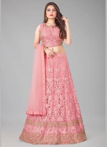 For A Different Look , Grab These Beautiful Lehenga in Lovely Colored Pair With Blouse And Dupatta.These Lehnega is Fabricated On Net Based Pair With Net Blouse And Net Dupatta.Its Beautified With Designer Embroidery Work