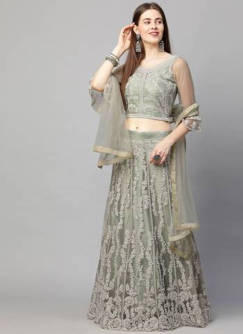 For A Different Look , Grab These Beautiful Lehenga in Lovely Colored Pair With Blouse And Dupatta.These Lehnega is Fabricated On Net Based Pair With Net Blouse And Net Dupatta.Its Beautified With Designer Embroidery Work