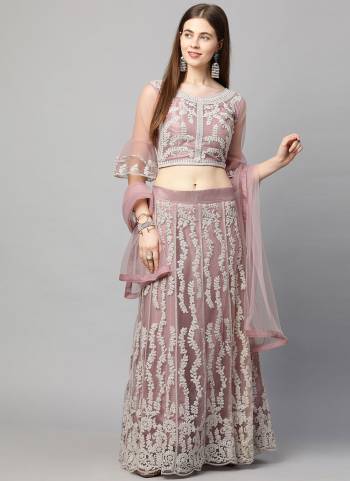 For A Different Look , Grab These Beautiful Lehenga in Lovely Colored Pair With Blouse And Dupatta.These Lehnega is Fabricated On Net Based Pair With Net Blouse And Net Dupatta.Its Beautified With Designer Embroidery Work