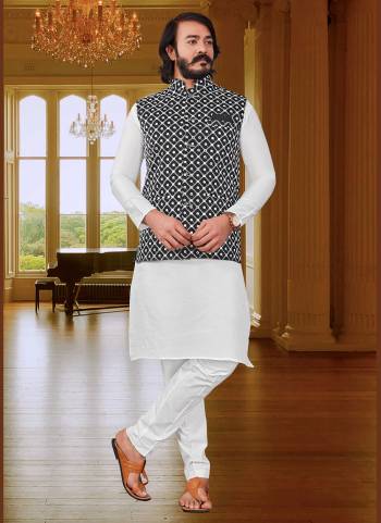 Here Is A Rich And Decent Looking Readymade Pair Of Men's Wear. This Jacket And?Top Are Art Silk Fabricated Pair With Cotton Payjama. Buy This Pair For The Upcoming Wedding And Festive Season