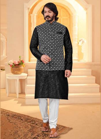 Here Is A Rich And Decent Looking Readymade Pair Of Men's Wear. This Jacket And?Top Are Art Silk Fabricated Pair With Cotton Payjama. Buy This Pair For The Upcoming Wedding And Festive Season