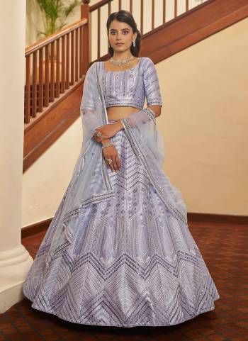 You Will Definitely Earn Lots Of Compliments Wearing This Designer Lehenga in Lovely Colored Pair With Blouse And Dupatta.Its Lehenga Is Fabricated On Silk Pair With Silk Blouse And Net Dupatta.Beautified With Designer Embroidery.