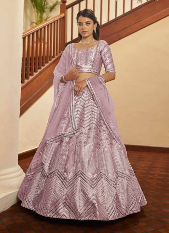 You Will Definitely Earn Lots Of Compliments Wearing This Designer Lehenga in Lovely Colored Pair With Blouse And Dupatta.Its Lehenga Is Fabricated On Silk Pair With Silk Blouse And Net Dupatta.Beautified With Designer Embroidery.