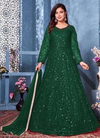 Elegant And Attractive, Both At The Same Time With This Beautiful Designer Suit In Fine Colored.These Top And Dupatta Are Fabricated On Net Based Pair With Santoon Bottom.Its Beautified With Designer Sequance Embroidery Work.