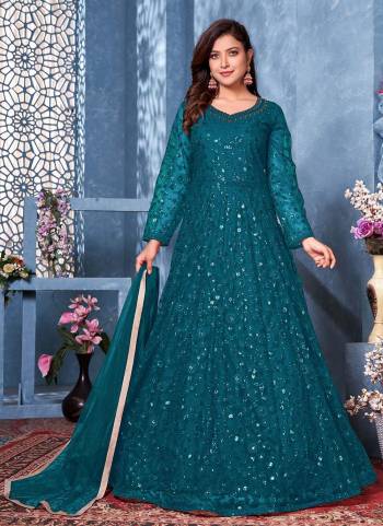 Elegant And Attractive, Both At The Same Time With This Beautiful Designer Suit In Fine Colored.These Top And Dupatta Are Fabricated On Net Based Pair With Santoon Bottom.Its Beautified With Designer Sequance Embroidery Work.