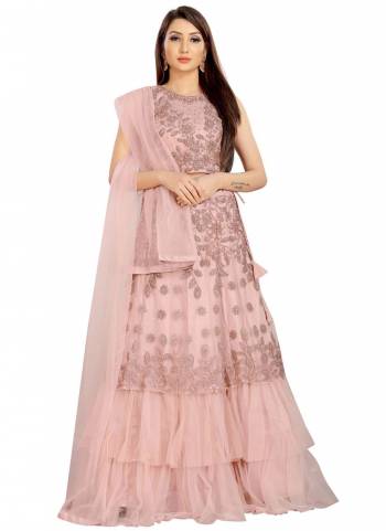 For A Different Look, Grab These Designer Lehenga Choli Come With Pretty Colored.These Lehenga is Fbaicated On Net Based.Its Beautified With Designer Embroidery Work.