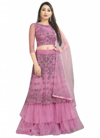 For A Different Look, Grab These Designer Lehenga Choli Come With Pretty Colored.These Lehenga is Fbaicated On Net Based.Its Beautified With Designer Embroidery Work.