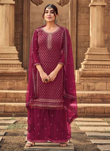 Grab These Sharara Suit in All Over Fine Colored Pair With Bottom And Dupatta.These Top Is Fabricated On Georgette Pair With Butterfly Net Bottom And Dupatta.Its Beautified With Designer Heavy Embroidery Work